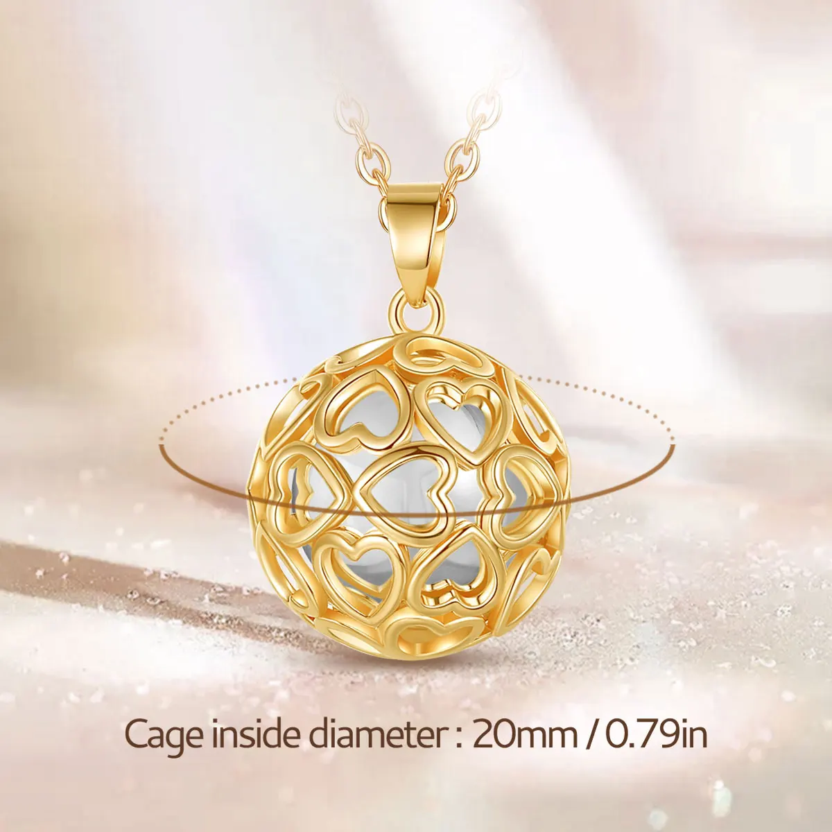 Bola de grossesse plaqué or, cage cœurs entrelacés et bille blanche – Image 3